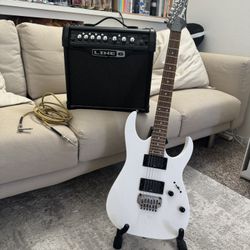 Ibanez RG2420 white electric guitar and amp, cord, and stand 