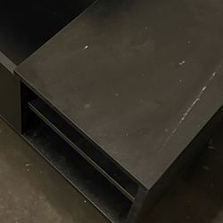 Coffee table with expanding table top