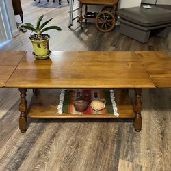 Solid Wood Coffee Table With Flip Up Extensions.