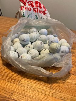 Golf balls, 50+ plus a bag of tees