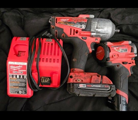 Milwaukee impact wrench & Milwaukee screw driver & charger.