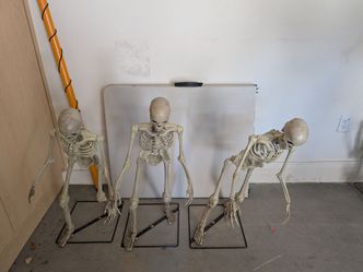 3 small standing  skeletons Halloween decorations