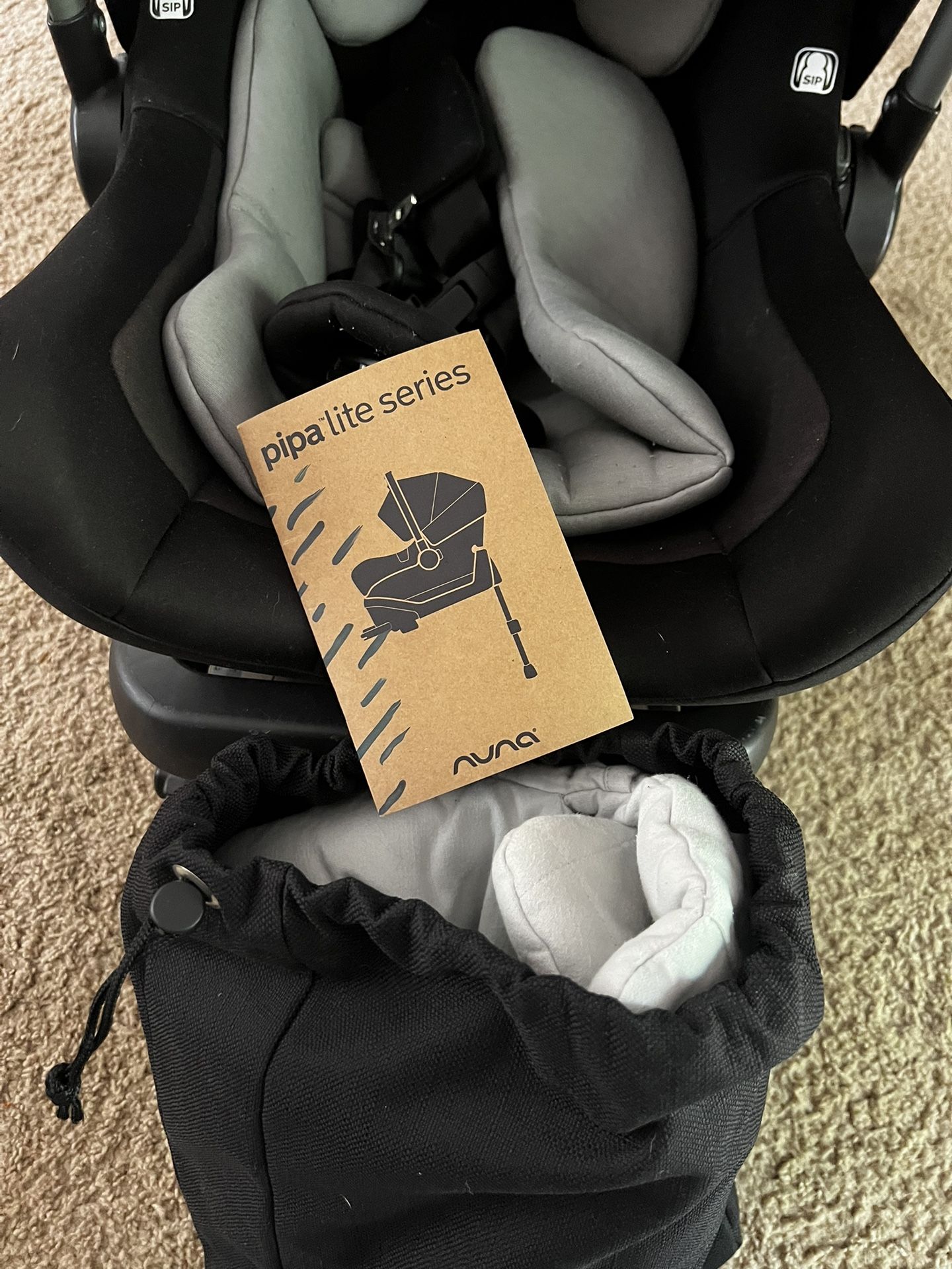 Never Used Nuna Pipa Lite Series Car Seat & Base