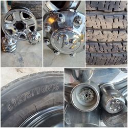 For sale. 4 stock dodge 2500 wheels. Set of wheel locks and 2 good tires. Located in Sanger. $350