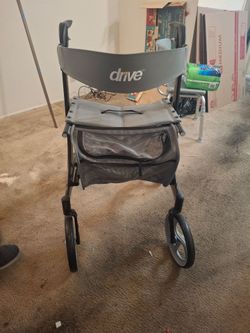 Brand New Drive Nitro Walker with bag and seat.