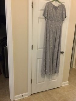 Wedding Dress, name brand , used once , worth $400.00,selling for only$100.00
