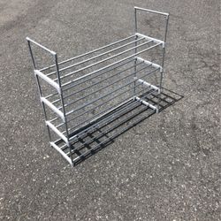 35”wx10”dx25”h Plastic and metal shoe rack