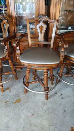 3 Stools with Upholstered Seats .