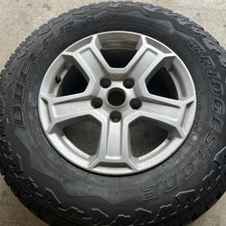 1 Jeep Wheel With Tire 