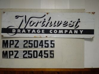 Vintage old metal Northwest Drayage Company Sign
