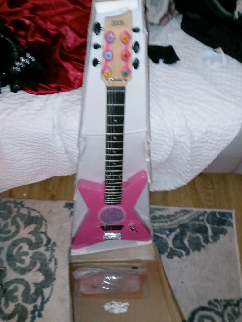 Child's Learning Electric Guitar