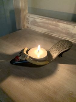 Cute “high heel” tealight holder. 5.5” long.