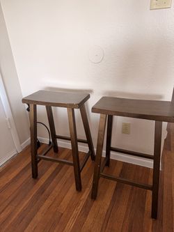 Dark wood barstools