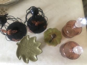ncludes two butterfly candle holders, a green leaf candle holder a pumpkin decor, and two deco pink glass bottles