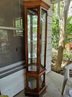 Tall skinny display cabinet