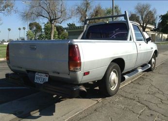 Mighty Max / D50 pickup 1985 Mitsubishi tags good thru Sept 2026