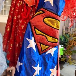 Superman Cape From MAGIC MOUNTAIN & SKIRT IS NEW FROM WALMART PUT TOGETHER ITS SOO CUTE FOR  GIRLS SIZE 12 -16  SKIRT IS NEW  & CAPE ONLY AT MAGIC MO 