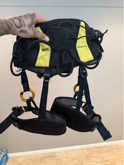 Tree climbing harness