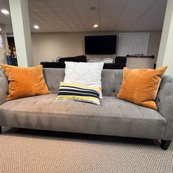 Used grey couch. Pillows included