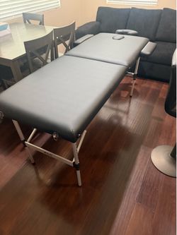 Massage table