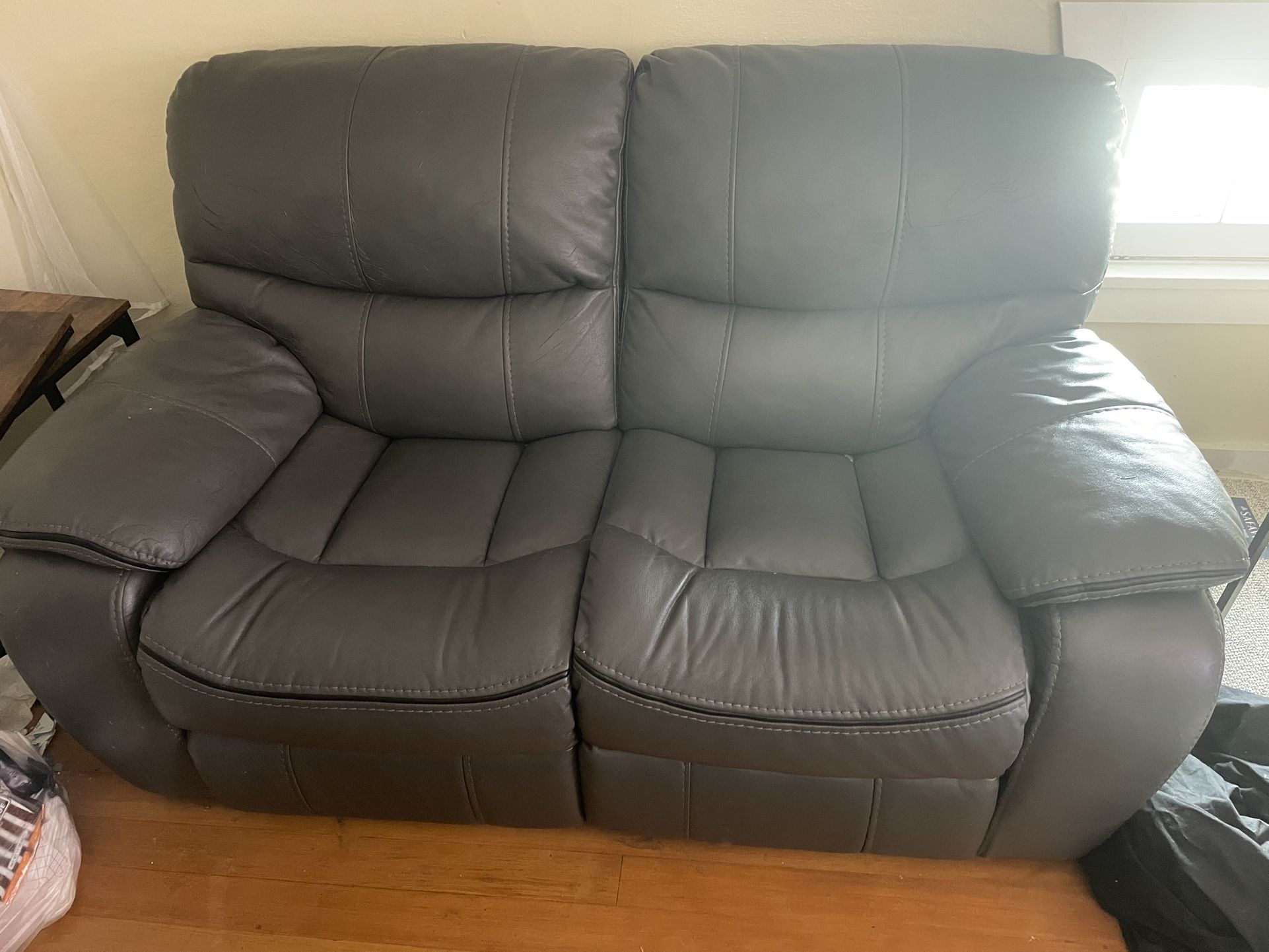 Grey Leather Reclining Couch