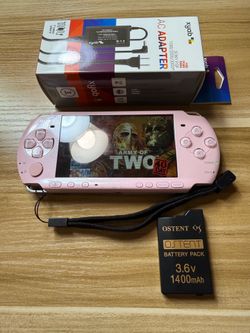 Pink PSP 3000 with 100 games installed.                T21