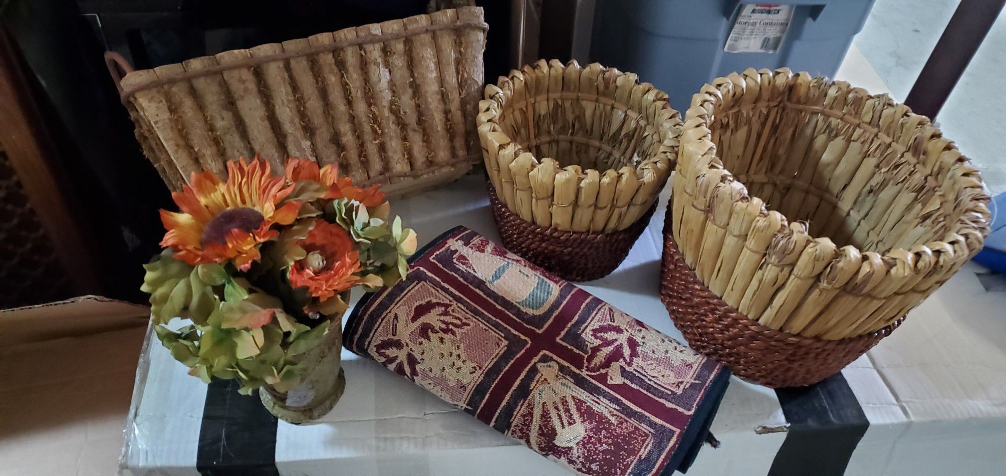 Baskets, table runner, artificial flower vase
