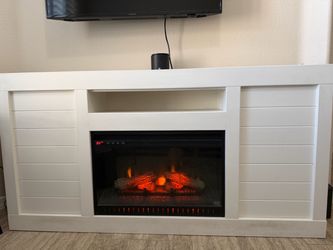 Fireplace entertainment/TV stand