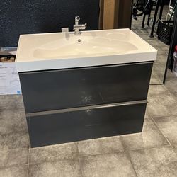 Restroom sink and mirror cabinet