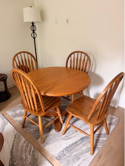 Wood table with four chairs.
