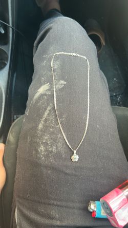 Sterling’s silver necklace with a sterling silver flower pendant