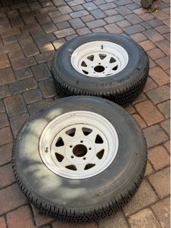 Dos. Llantas para tráela.p235/75R15