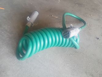 Phillips Industries 30-4624 is a 15-foot green ABS Permacoil™ electrical cable assembly designed for semi-trucks and trailers.