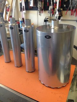 Concrete core bits from 1 1/2 up to 10 inches price $50 up to  $210 all will cut through rebar