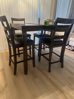 Dining table , black and dark brown.