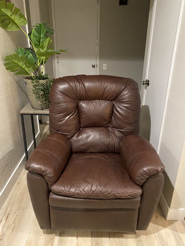 Ashley furniture 100 leather recliner chair for Sale in Las Vegas, NV