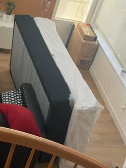 New mattress (twin) with metal mattress frame & casters