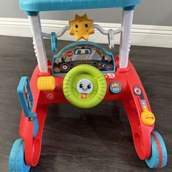 $10-USED Baby To Toddler Walker/ Playing Toy