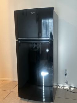Black Whirlpool refrigerator