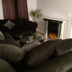 3 Peices Black sectional with Dark gray Pillows 
