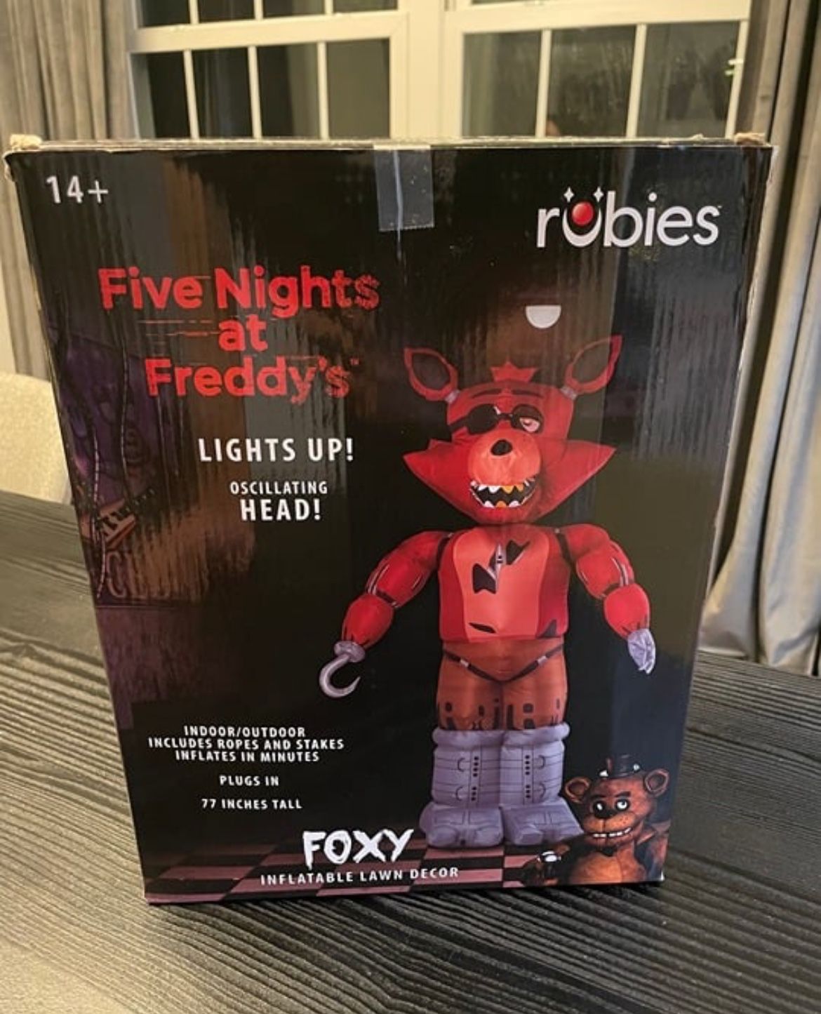 6.5 FT ANIMATED FIVE NIGHTS AT FREDDY'S INFLATABLE FOXY, IN HAND