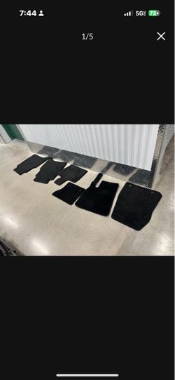 Six Land Rover floor mats $40