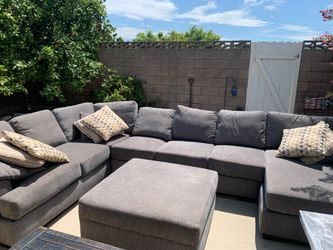 Sectional couch with extra large ottoman.  Like new barely used