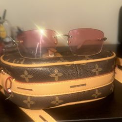 Authentic Cartier Pink Rimless Sunglasses