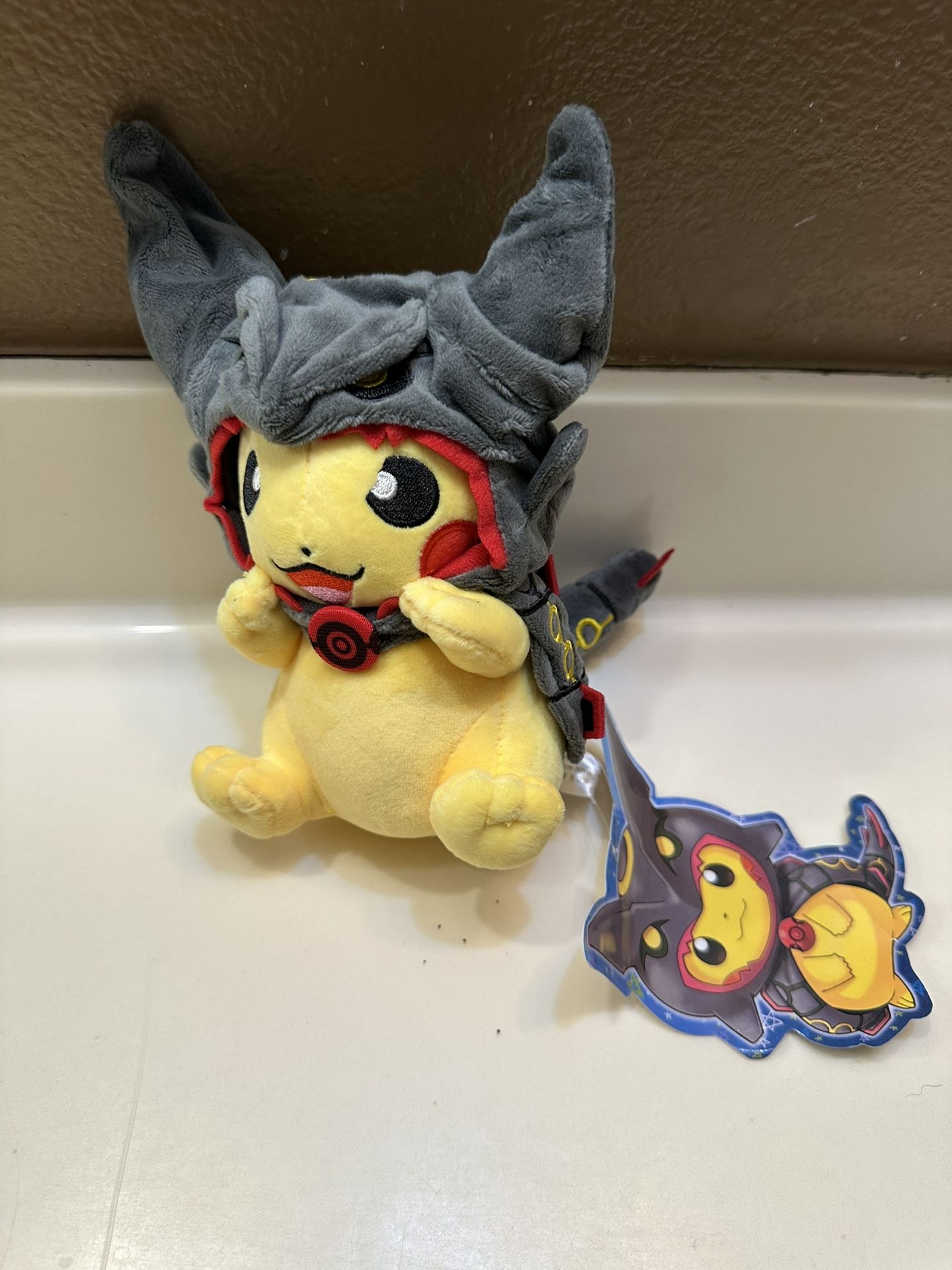 New Pikachu In A Shiny Rayquaza Pancho And Mega Charizard X Pikachu Poncho Pokemon Plushies
