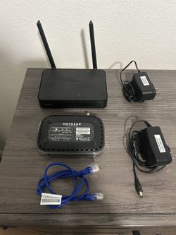 Netgear Router, Modem, And Cables