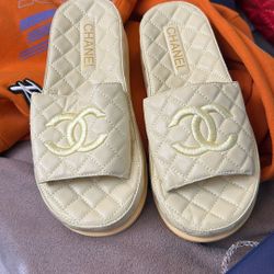 ladies chanel slide in yellow Gold shoes size 8