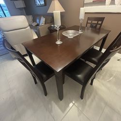 Table , Chairs And A Bench