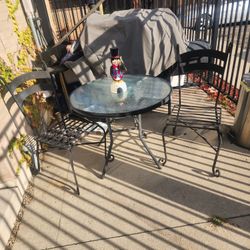 Outside Metal Glass Table With Metal Chairs