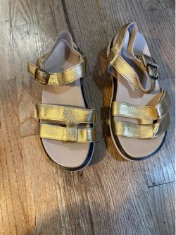 Vionic gold leather sandals.
